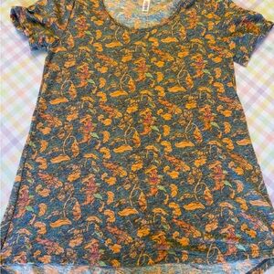 LuLaRoe Women's Tunic with Orange and Yellow Leaf Pattern